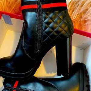 Black heeled booties.